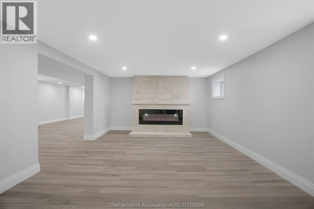6511 Queens Line, Raleigh Township, ON - Indoor With Fireplace