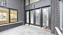 Walk-Out to Patio from Foyer -