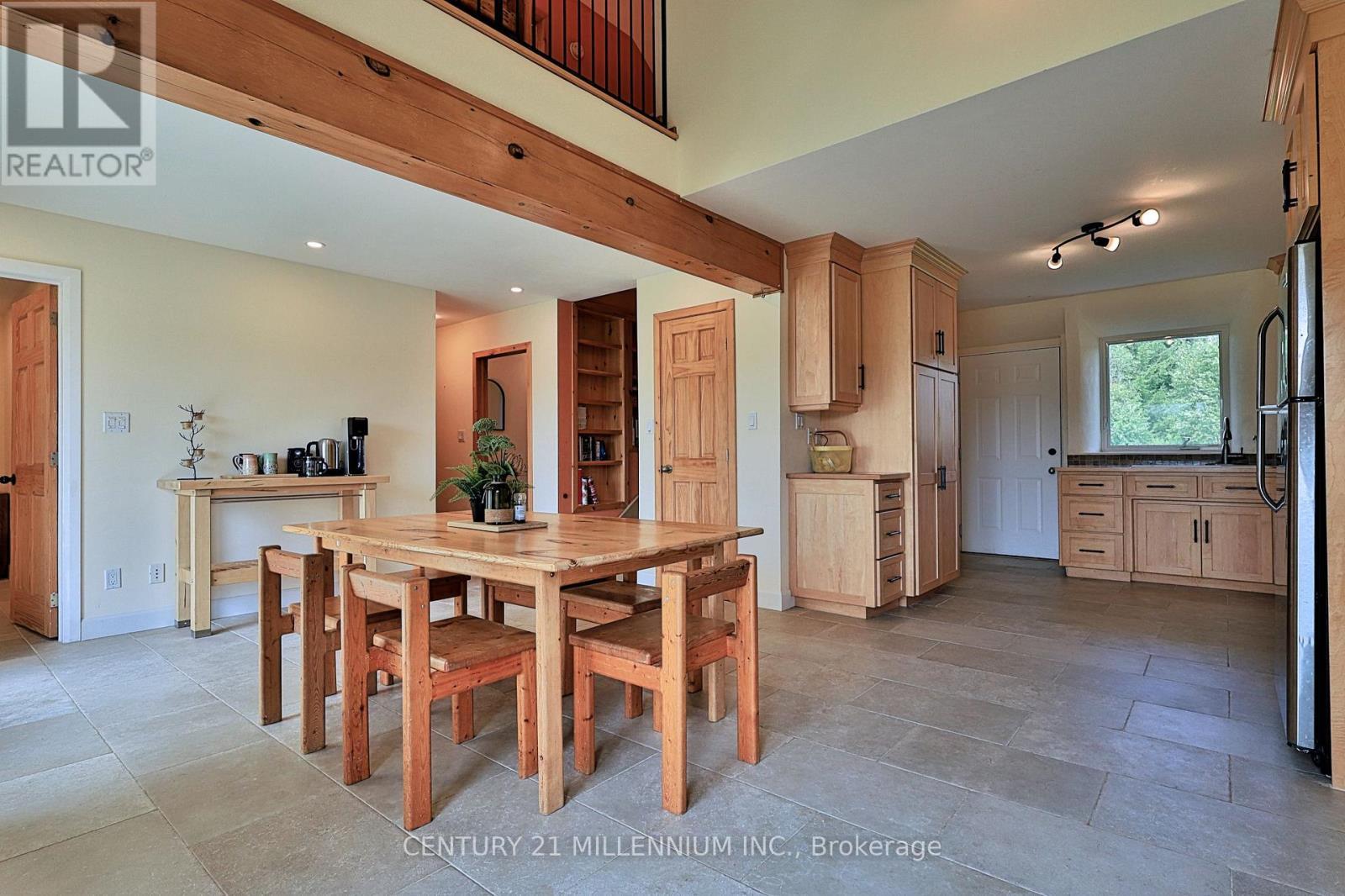Family size dining area with 2 walk-outs to yard - 322066 Concession Road 6-7, East Luther Grand Valley, ON - Indoor Photo Showing Dining Room