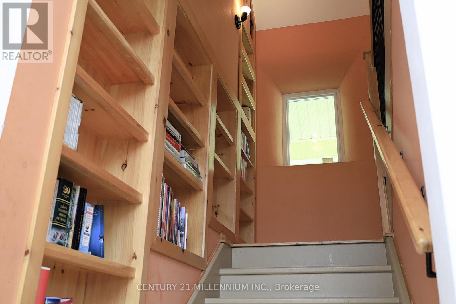 Stairs w/ built-in book shelves leads to 2 bdrms. - 322066 Concession Road 6-7, East Luther Grand Valley, ON - Indoor Photo Showing Other Room