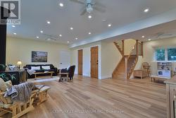 Great room: wood stove, in floor heating, play rm -