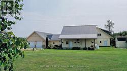 Summer photo- lovely front perennial gardens -