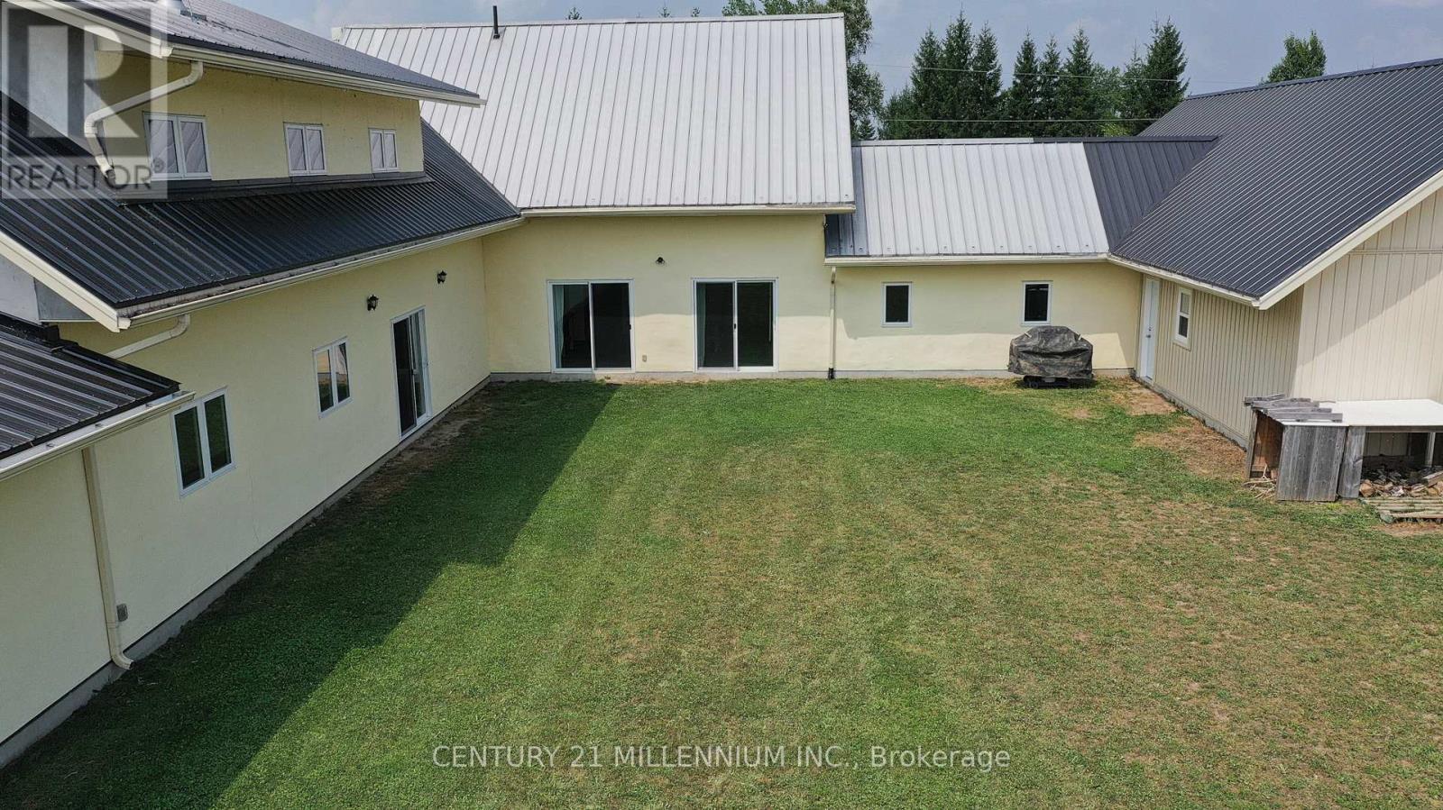 Courtyard- perfect location for a swimming pool! - 322066 Concession Road 6-7, East Luther Grand Valley, ON - Outdoor With Exterior