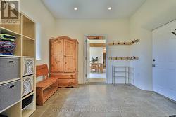 Mudroom area leads to kitchen & attached garage -