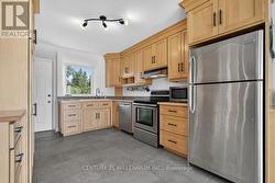 Custom maple cabinets, stainless steel appliances -