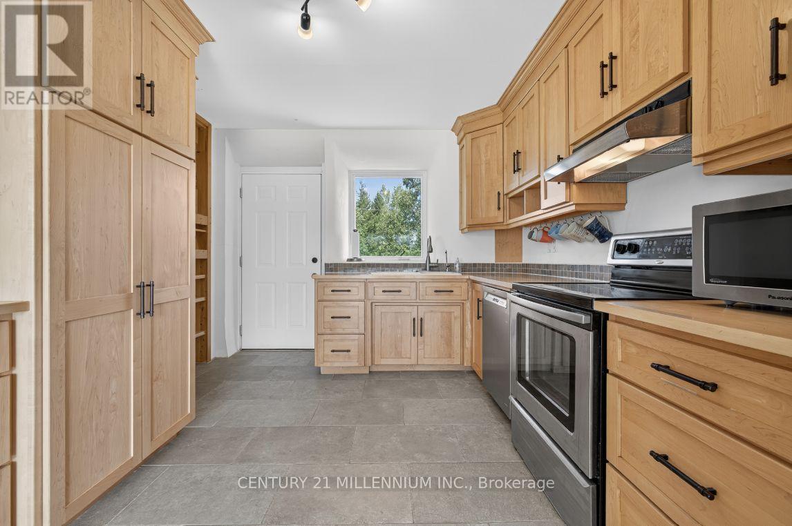 Access from kitchen to Front covered porch - 322066 Concession Road 6-7, East Luther Grand Valley, ON - Indoor Photo Showing Kitchen