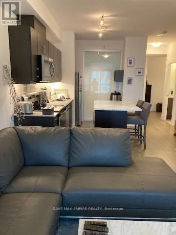 204 - 1486 Bathrust Street, Toronto, ON - Indoor Photo Showing Living Room