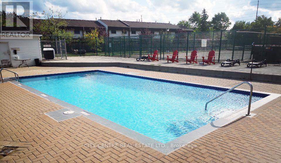 208 - 2900 Battleford Road, Mississauga, ON - Outdoor With In Ground Pool
