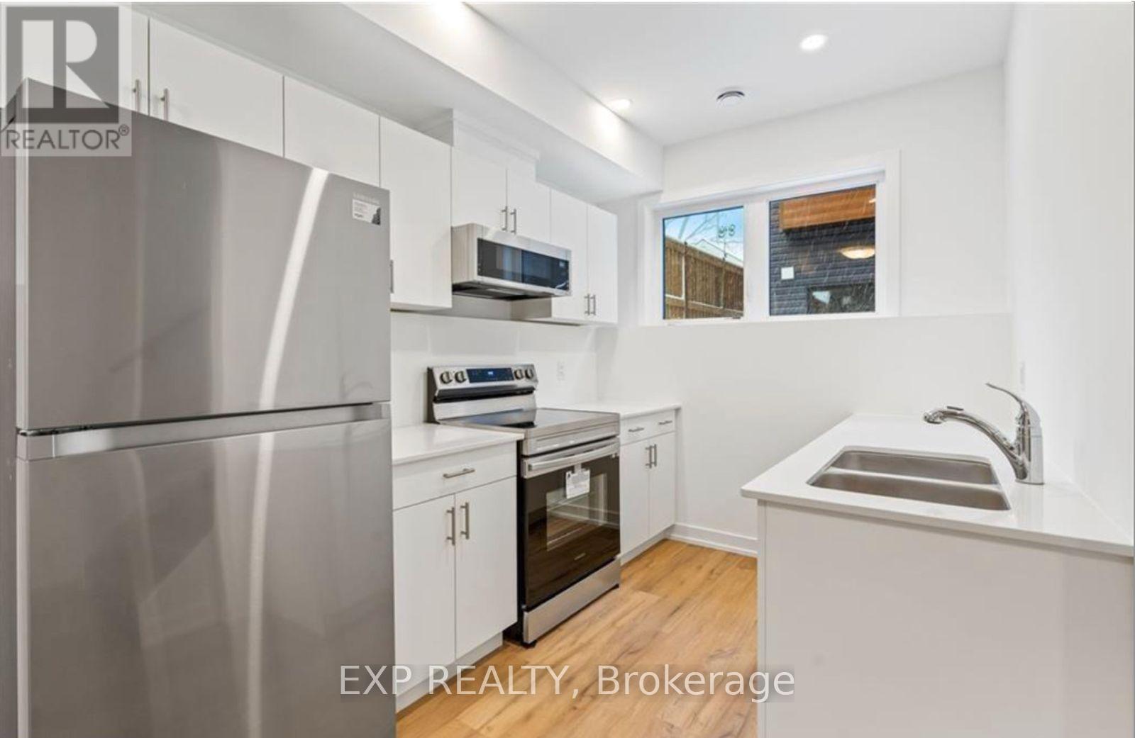 314 - 781 Clare Avenue, Welland, ON - Indoor Photo Showing Kitchen With Double Sink