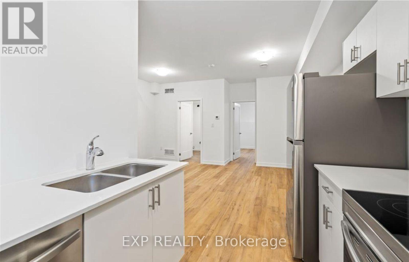 314 - 781 Clare Avenue, Welland, ON - Indoor Photo Showing Kitchen With Double Sink