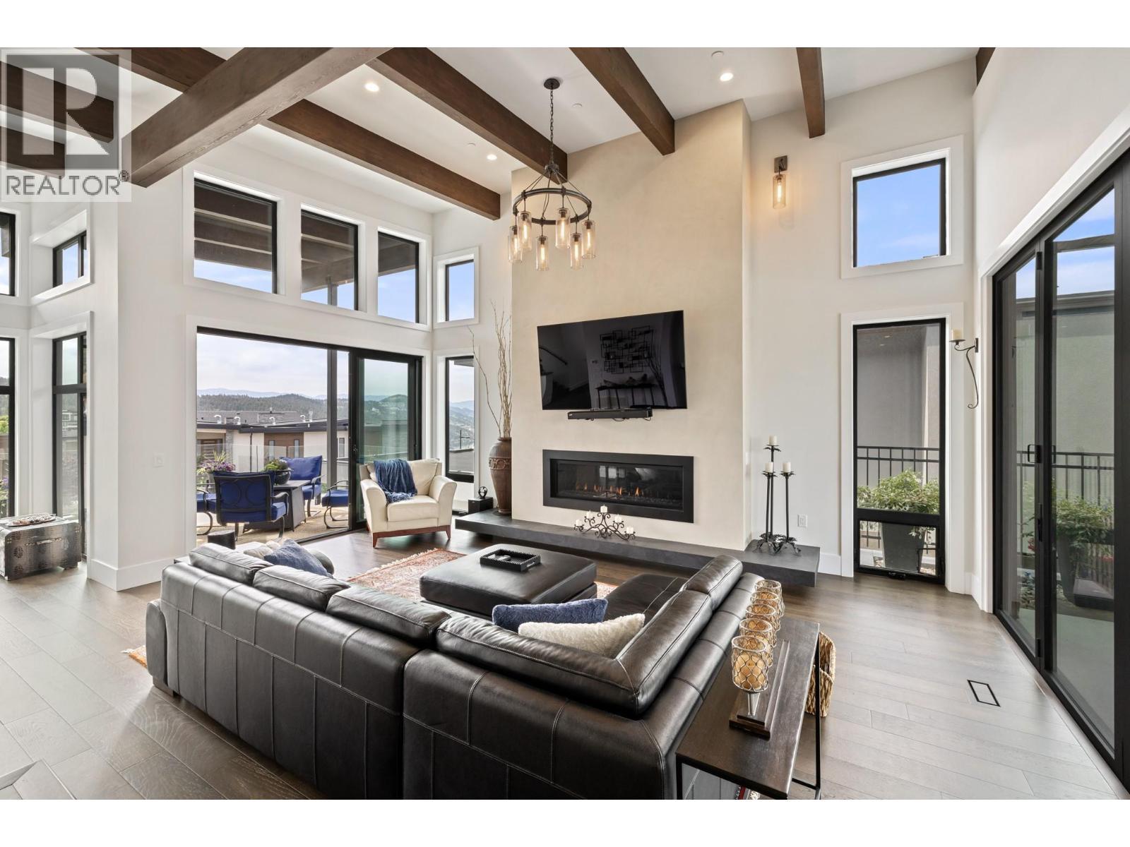 9532 Benchland Drive, Lake Country, BC - Indoor Photo Showing Other Room With Fireplace