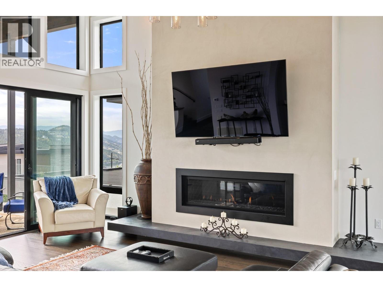 9532 Benchland Drive, Lake Country, BC - Indoor Photo Showing Living Room With Fireplace