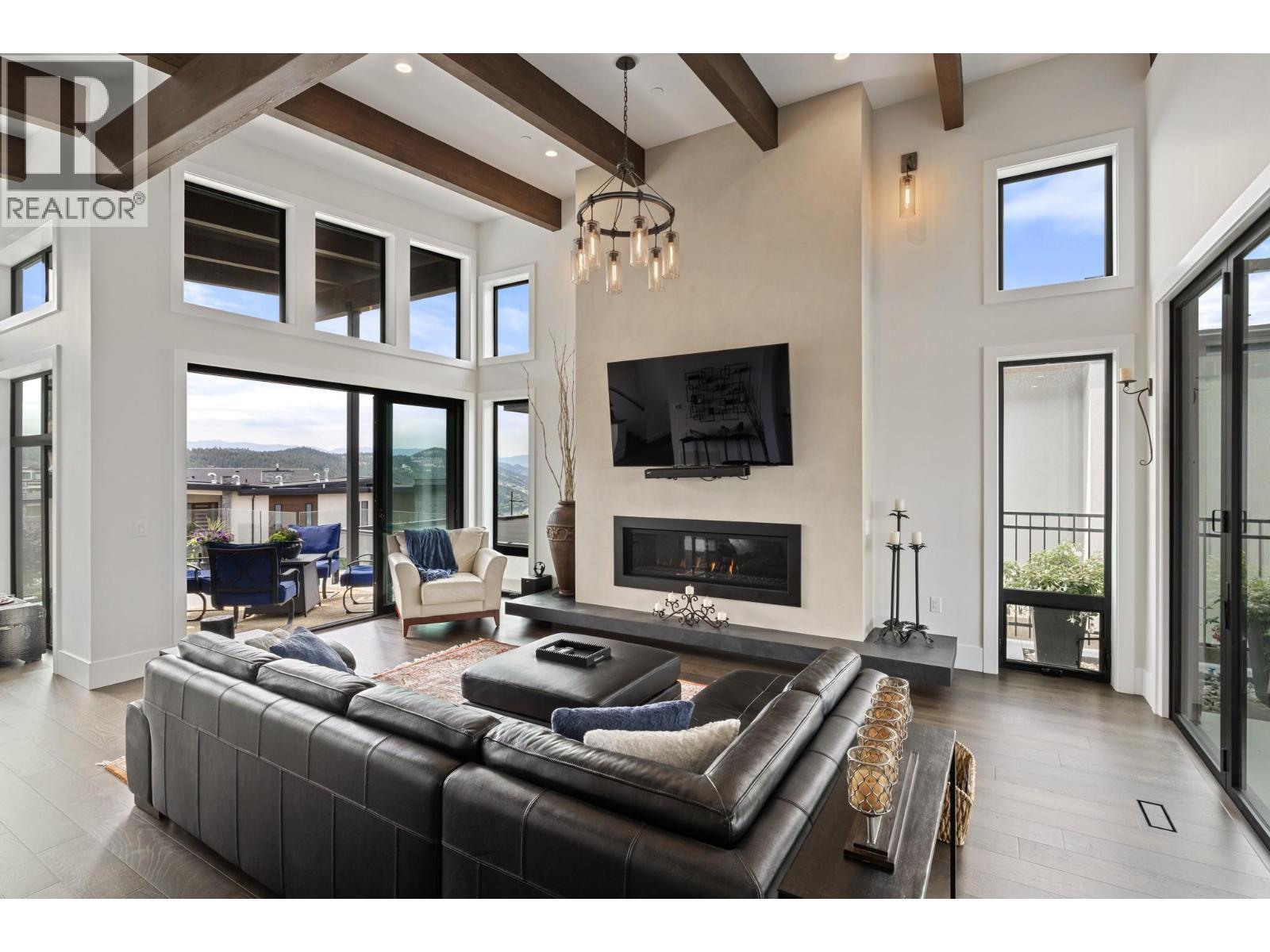 9532 Benchland Drive, Lake Country, BC - Indoor Photo Showing Living Room With Fireplace