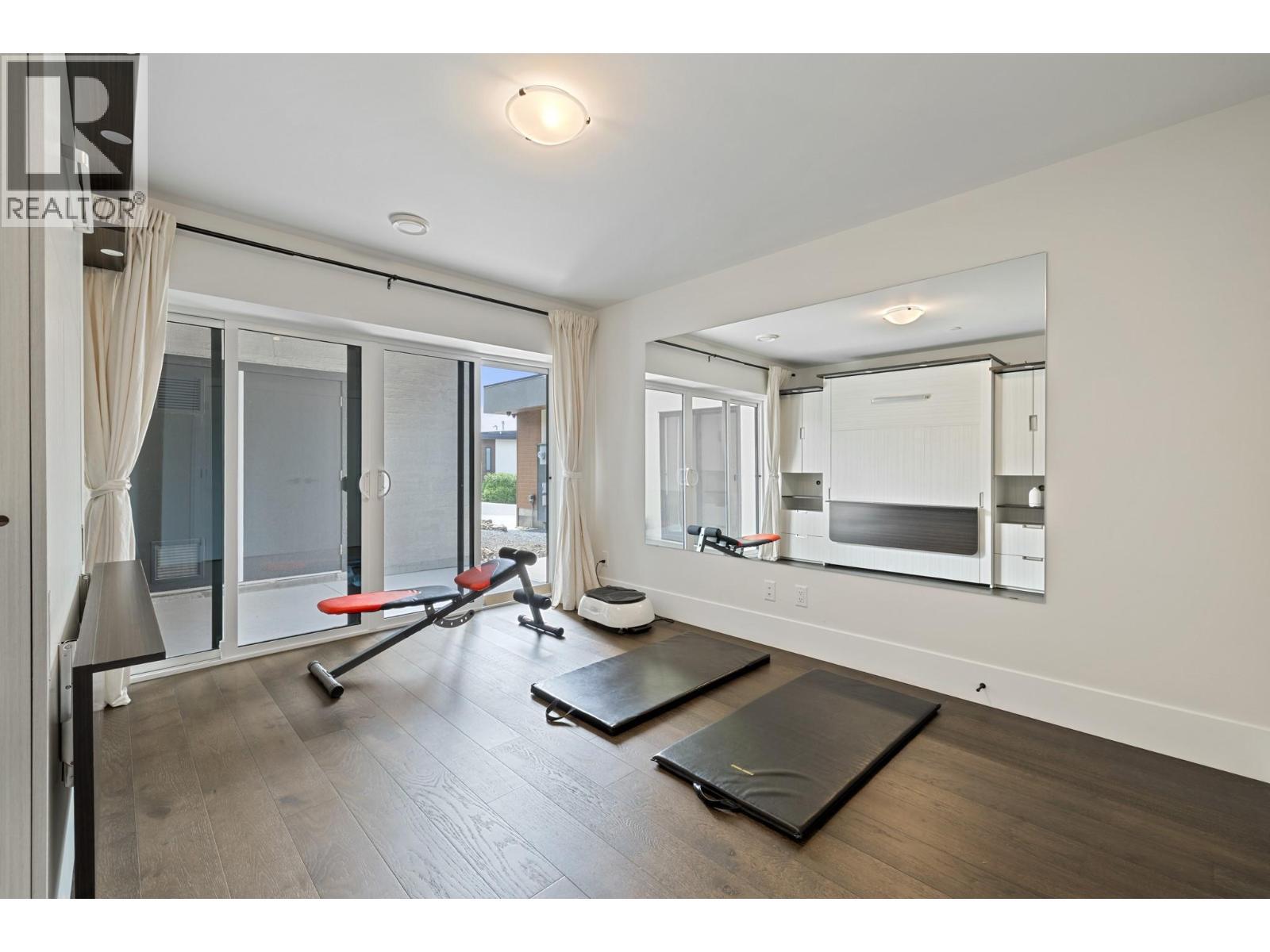 9532 Benchland Drive, Lake Country, BC - Indoor Photo Showing Gym Room