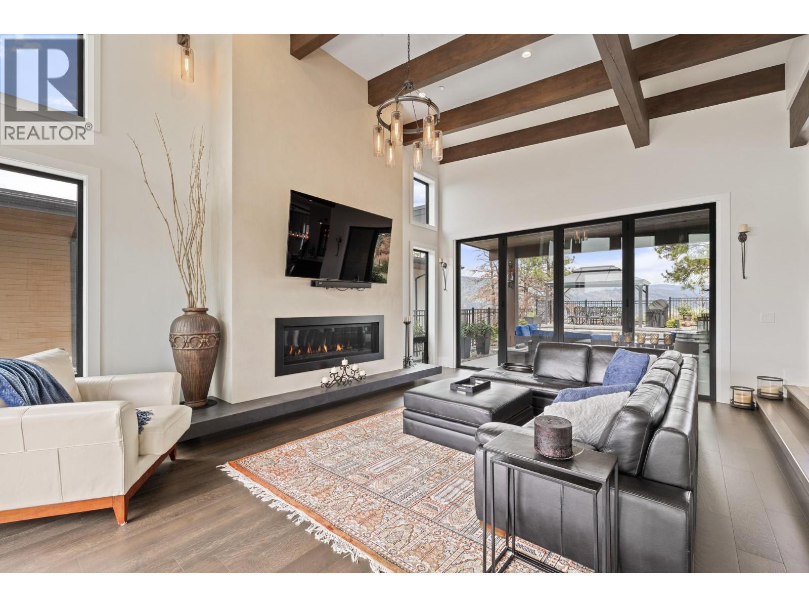 9532 Benchland Drive, Lake Country, BC - Indoor Photo Showing Living Room With Fireplace