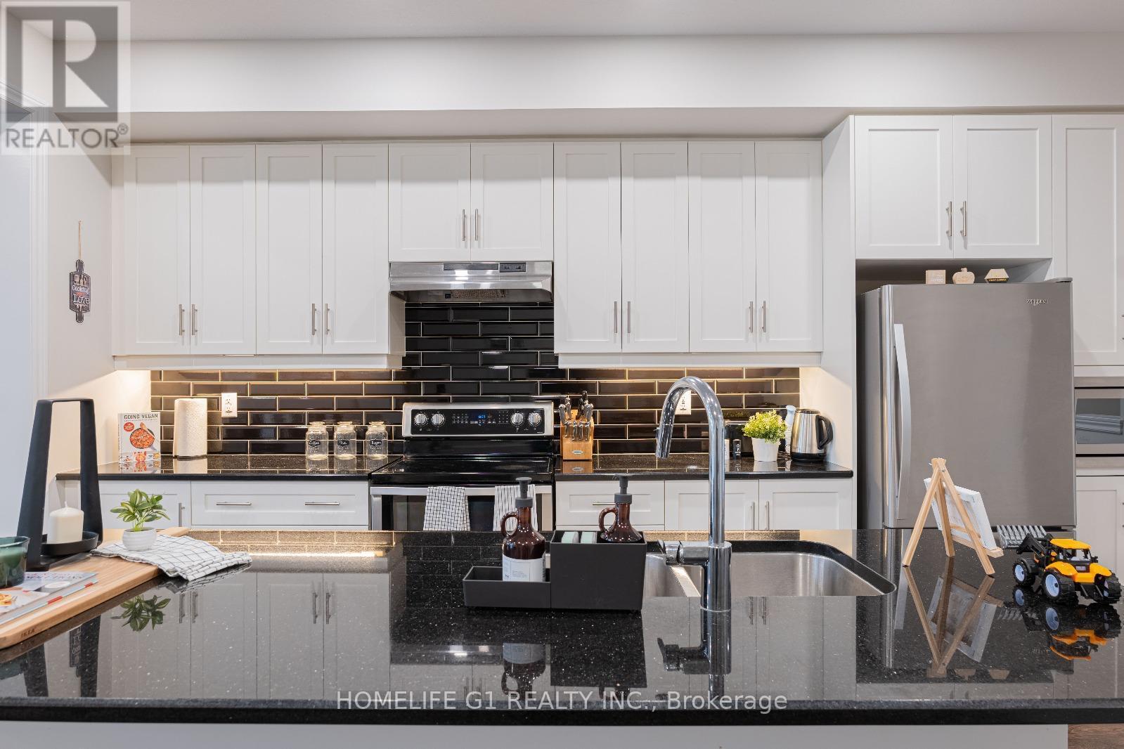 385 Threshing Mill Boulevard, Oakville, ON - Indoor Photo Showing Kitchen With Upgraded Kitchen