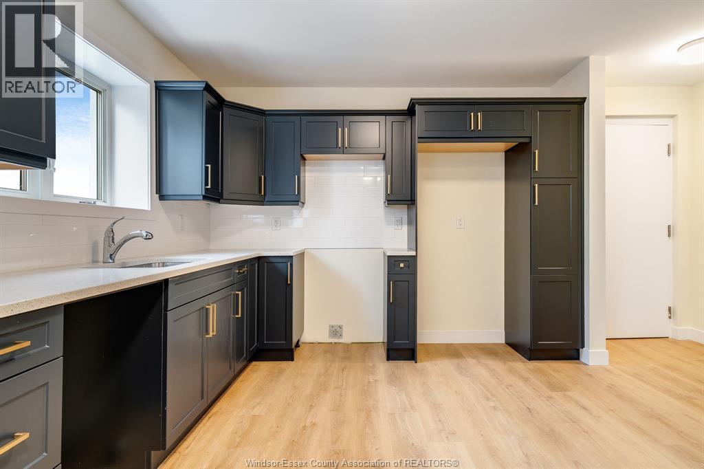 4 Bruce Avenue Unit# 4, Leamington, ON - Indoor Photo Showing Kitchen With Double Sink