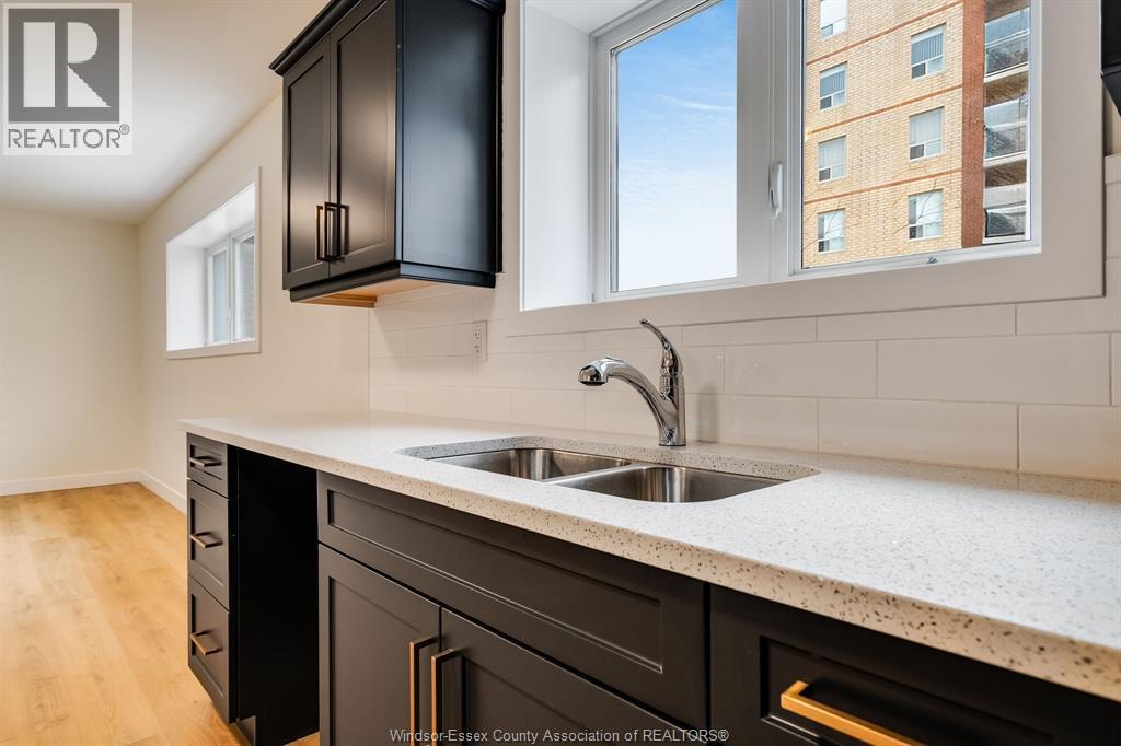 4 Bruce Avenue Unit# 4, Leamington, ON - Indoor Photo Showing Kitchen With Double Sink