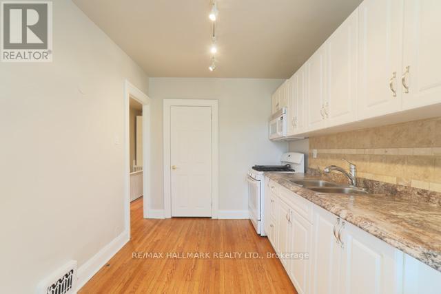 Upper - 1481 Queen Street E, Toronto, ON - Indoor Photo Showing Kitchen With Double Sink