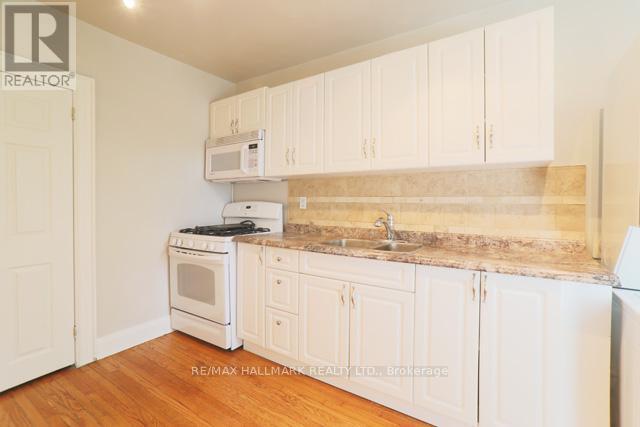 Upper - 1481 Queen Street E, Toronto, ON - Indoor Photo Showing Kitchen With Double Sink