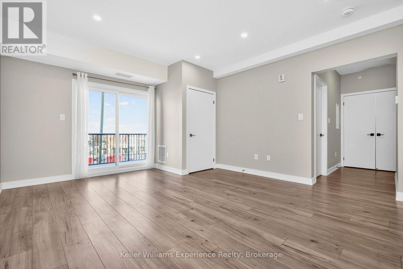 216 - 4 Spice Way, Barrie, ON - Indoor Photo Showing Other Room