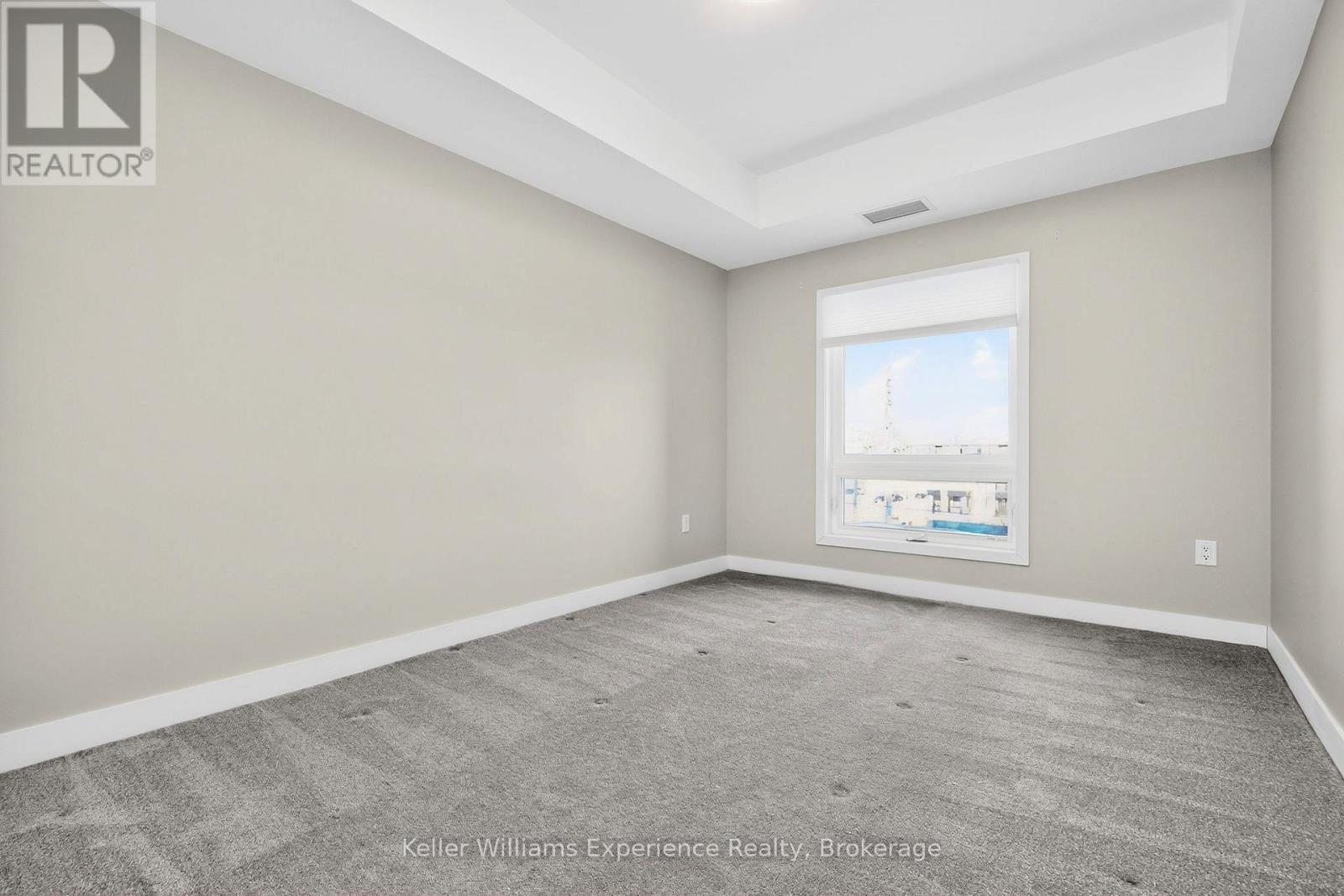 216 - 4 Spice Way, Barrie, ON - Indoor Photo Showing Other Room