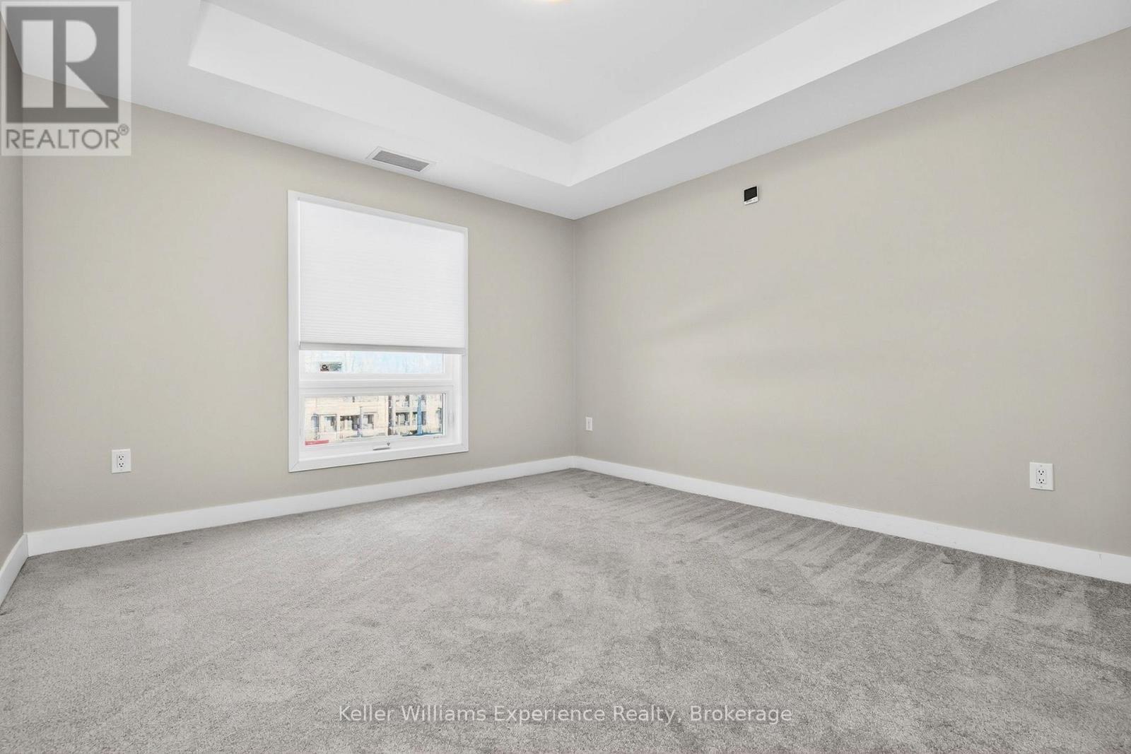 216 - 4 Spice Way, Barrie, ON - Indoor Photo Showing Other Room