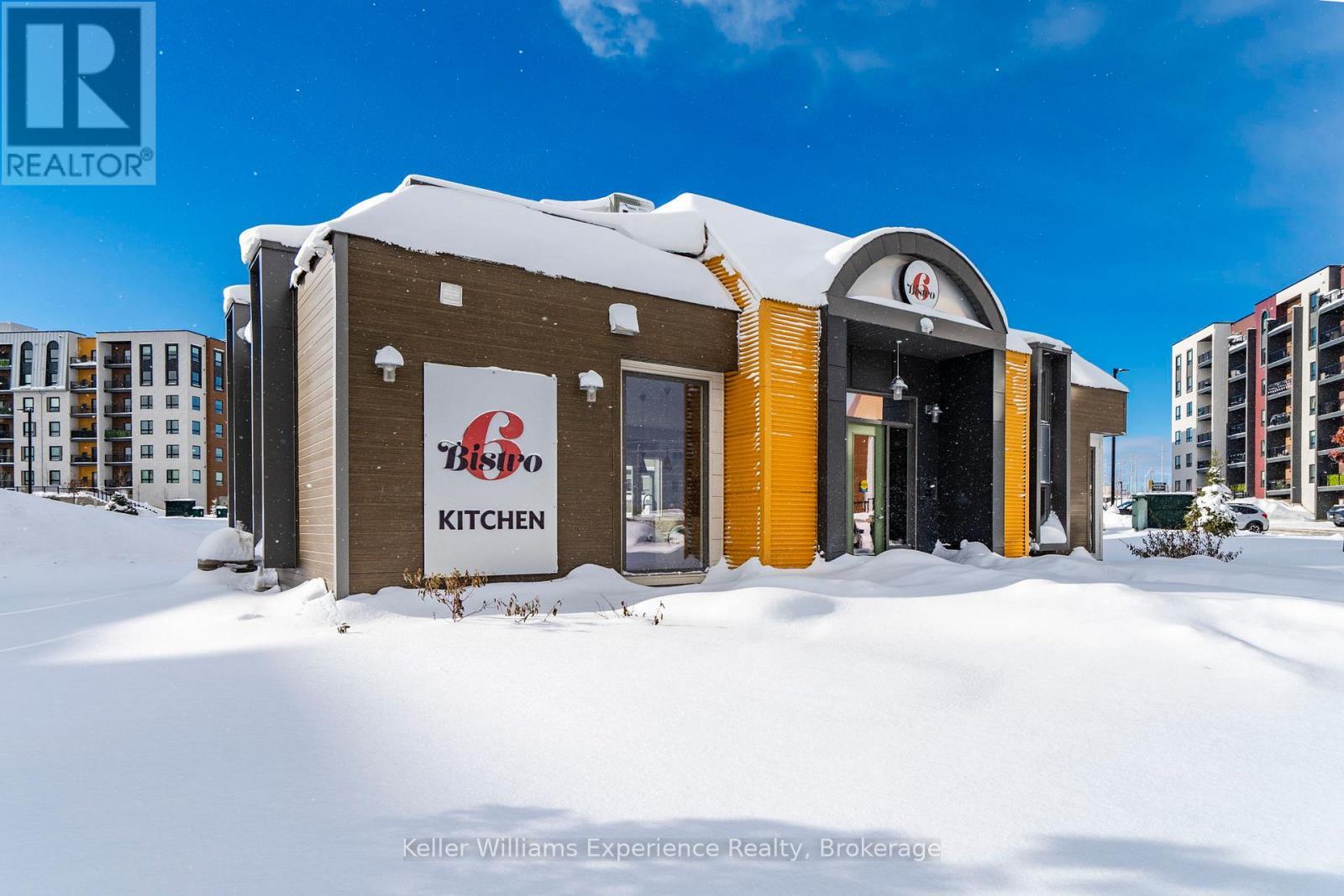 216 - 4 Spice Way, Barrie, ON - Outdoor With Facade