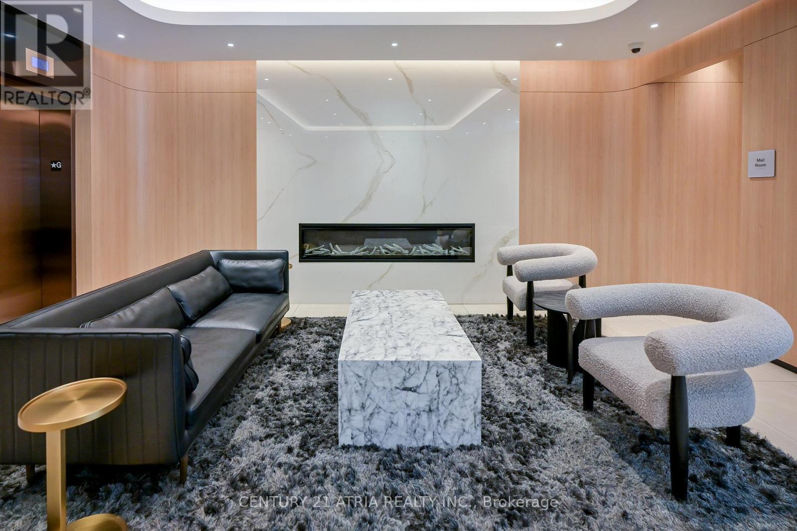 303 - 185 Alberta Avenue, Toronto, ON - Indoor With Fireplace