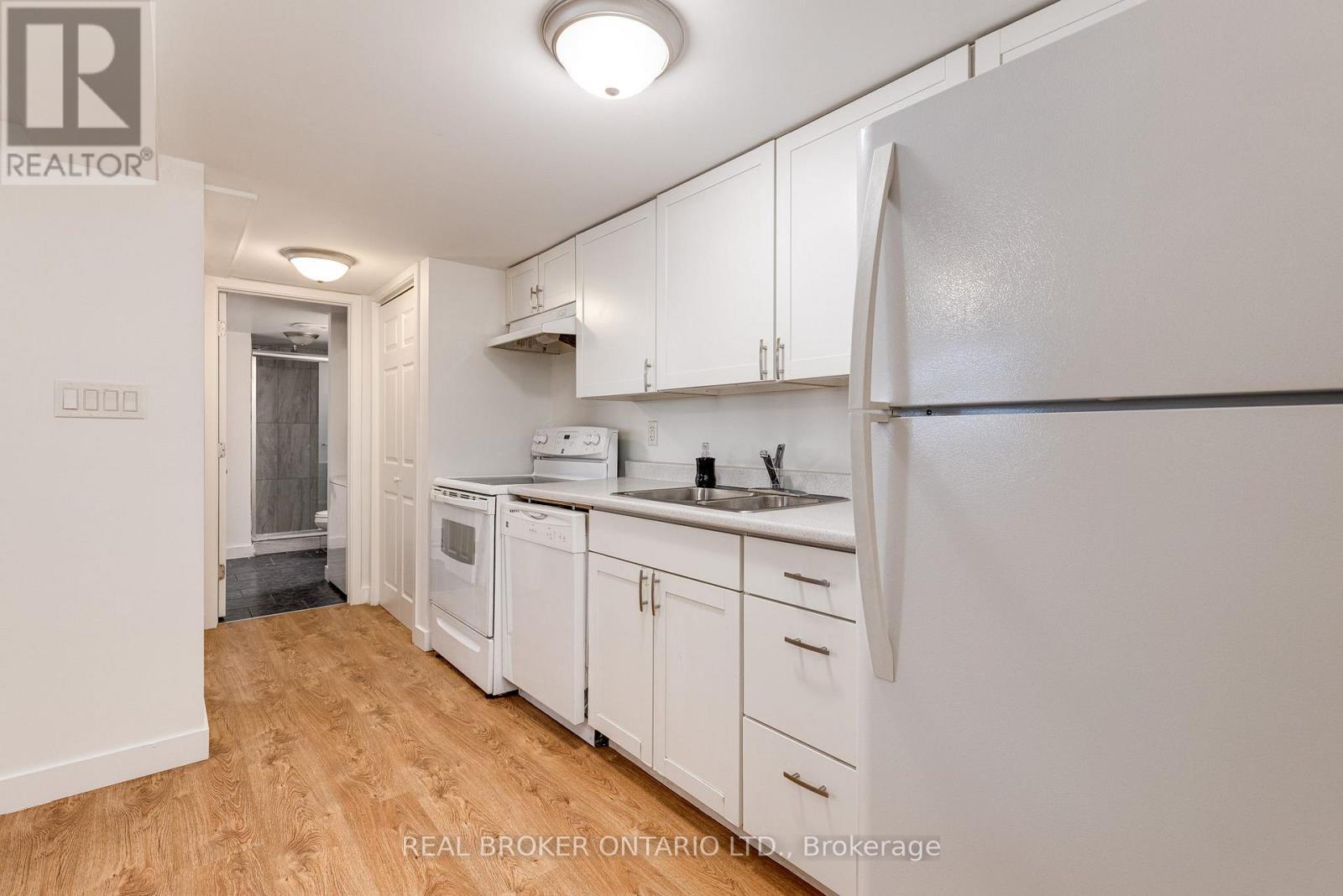 Lower - 371 Jones Avenue, Toronto, ON - Indoor Photo Showing Kitchen With Double Sink