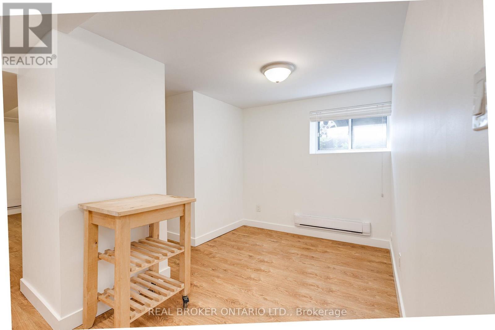 Lower - 371 Jones Avenue, Toronto, ON - Indoor Photo Showing Other Room