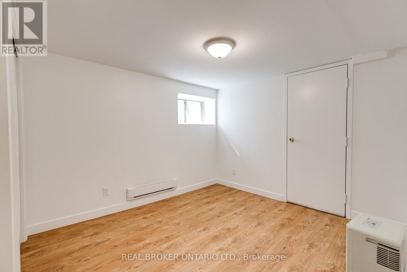 Lower - 371 Jones Avenue, Toronto, ON - Indoor Photo Showing Other Room