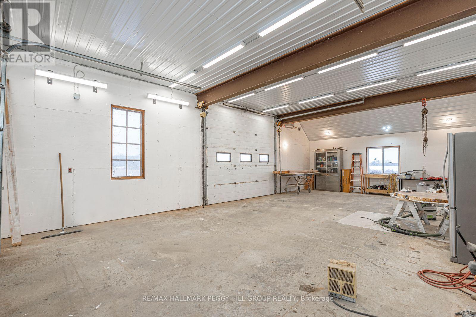 8464 6Th Line, Essa, ON - Indoor Photo Showing Garage