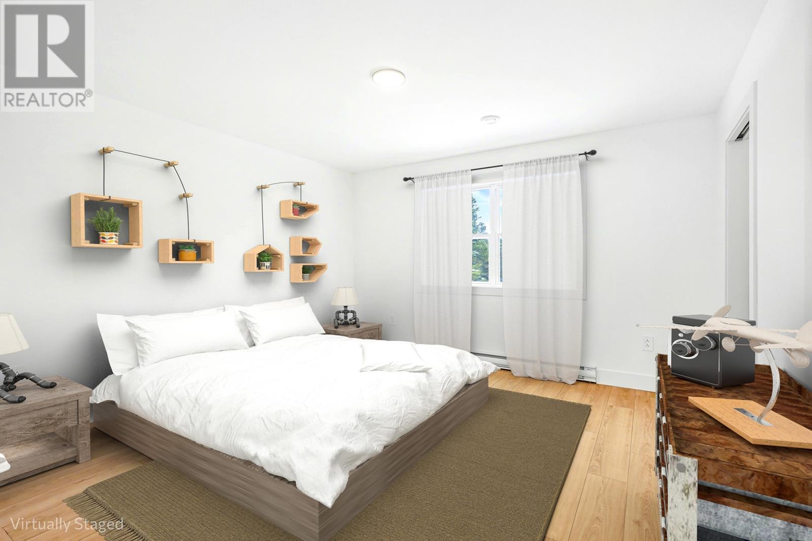 21-23 Cameron Place, Pouch Cove, NL - Indoor Photo Showing Bedroom