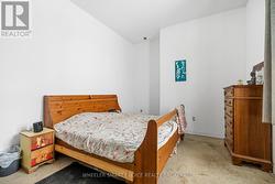 another view of a bedroom -