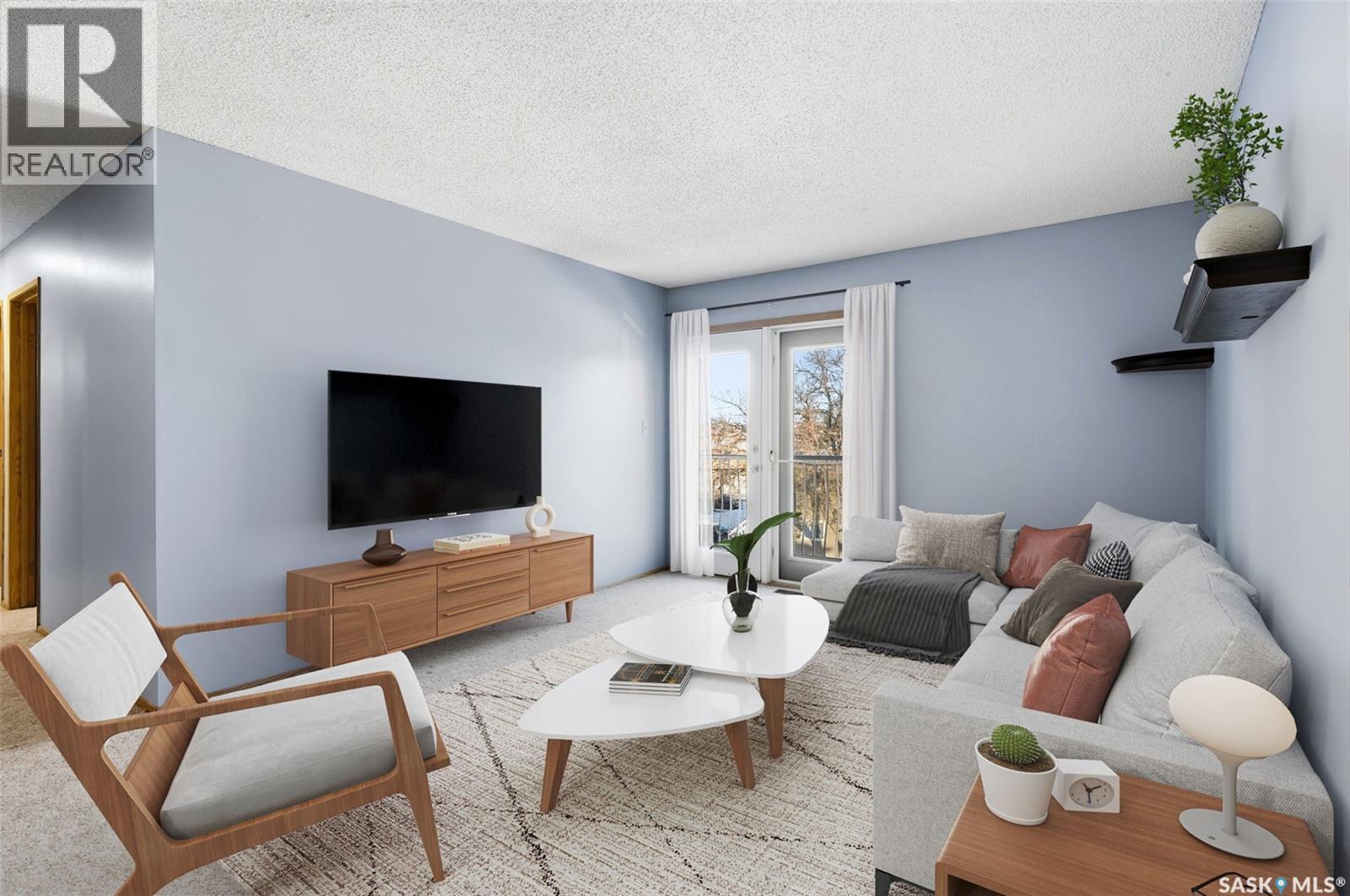 17 6575 Rochdale Boulevard, Regina, SK - Indoor Photo Showing Living Room