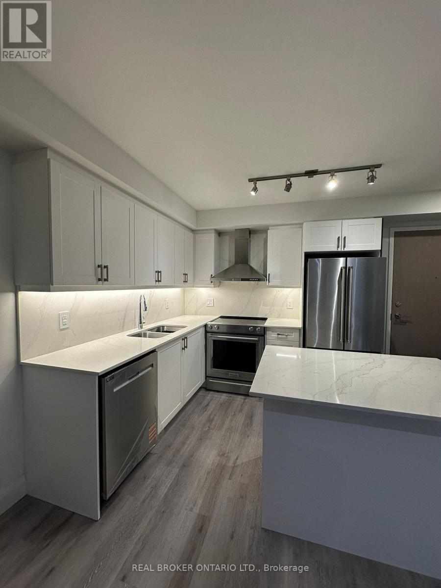 802 - 58 Lakeside Terrace, Barrie, ON - Indoor Photo Showing Kitchen With Stainless Steel Kitchen With Double Sink