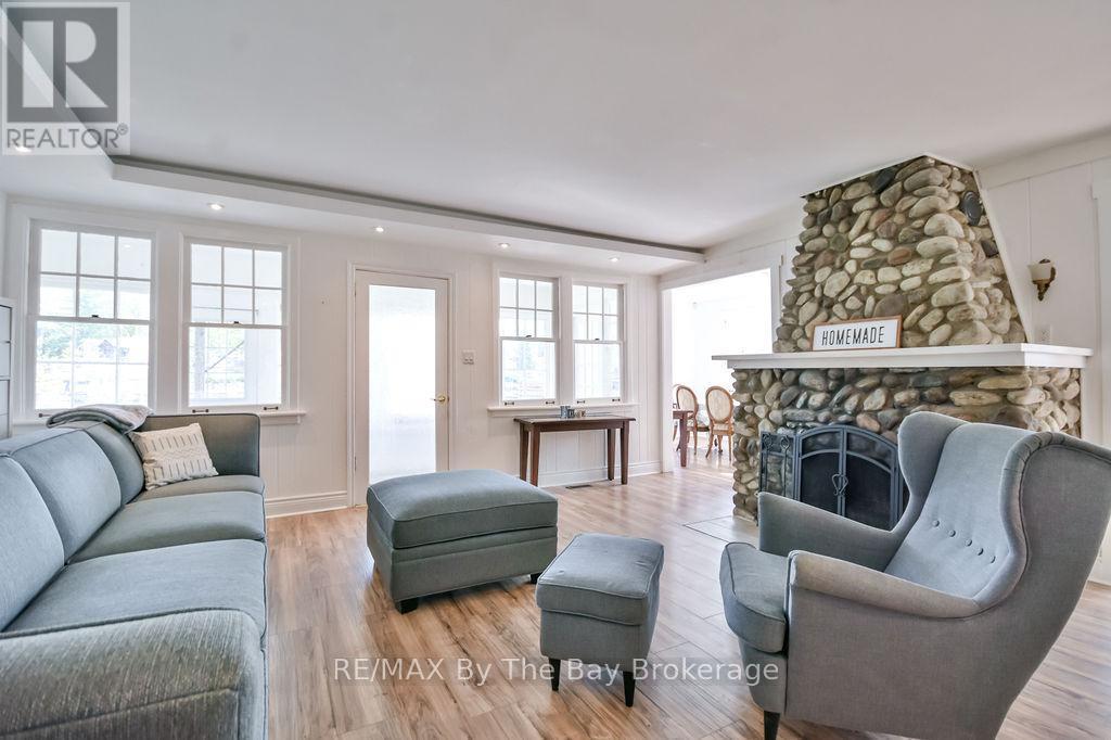 3 - 1067 Mosley Street, Wasaga Beach, ON - Indoor Photo Showing Living Room With Fireplace