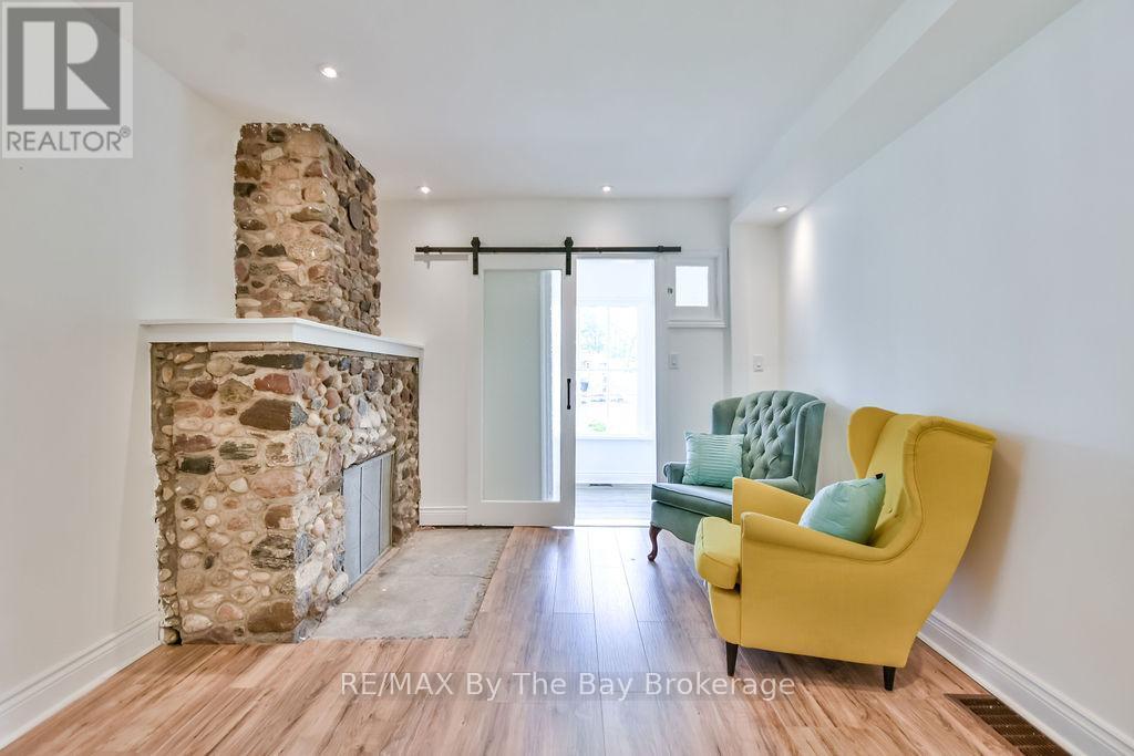 3 - 1067 Mosley Street, Wasaga Beach, ON - Indoor With Fireplace