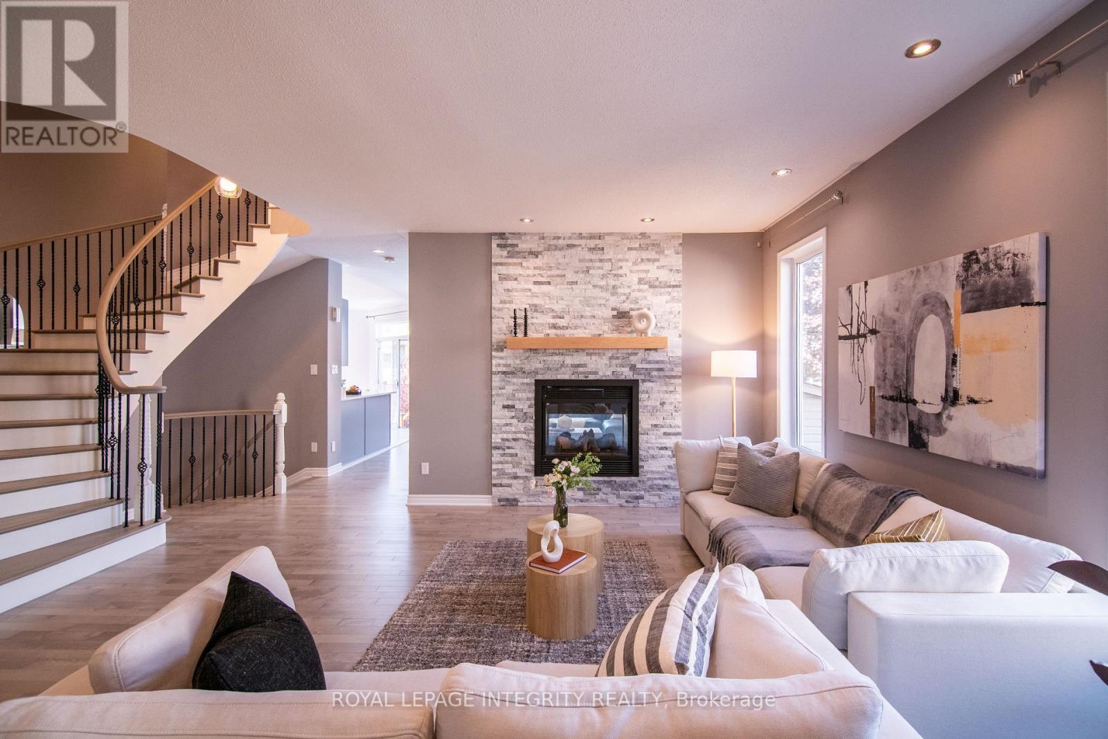 34 Keighley Circle, Ottawa, ON - Indoor Photo Showing Living Room With Fireplace