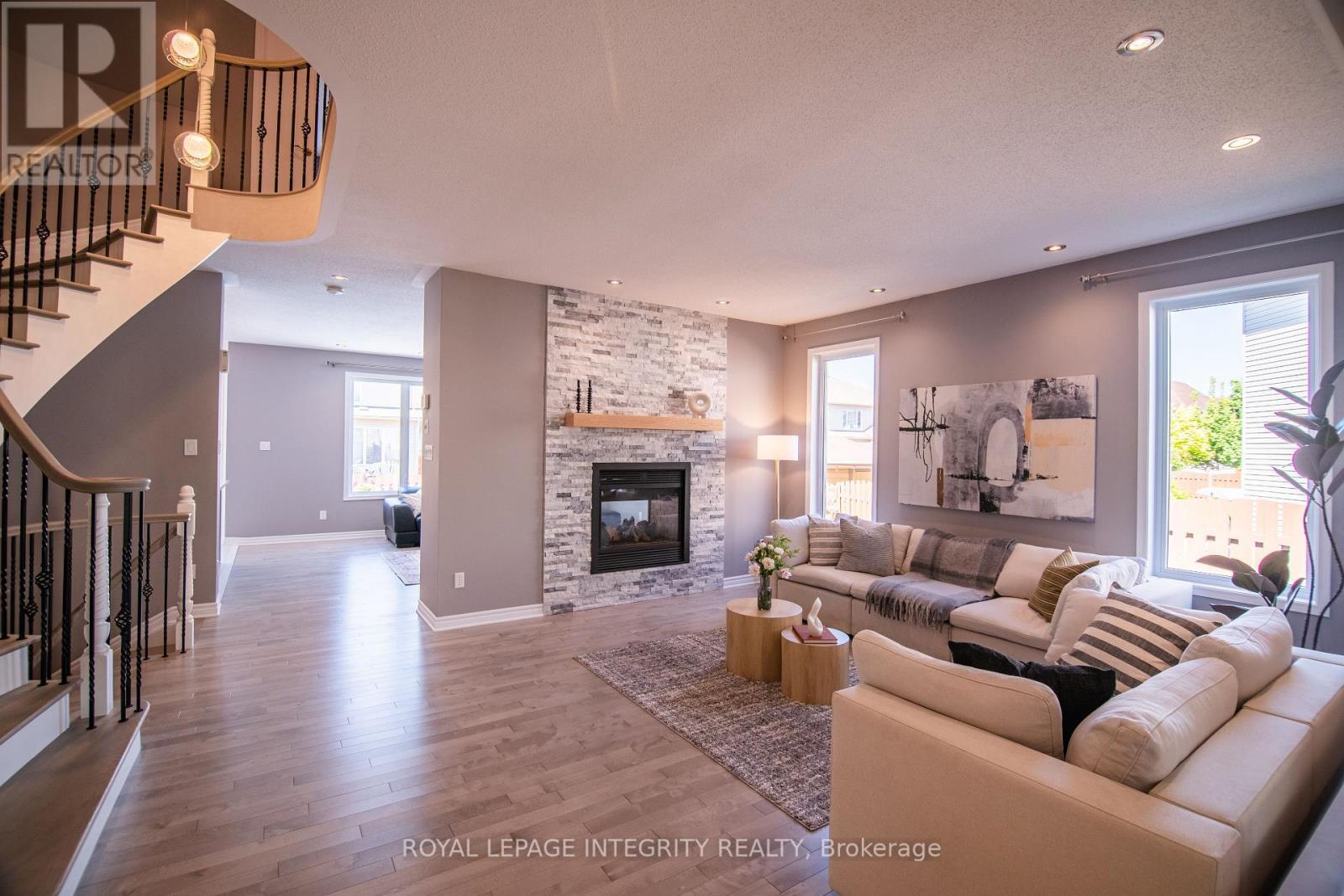 34 Keighley Circle, Ottawa, ON - Indoor Photo Showing Living Room With Fireplace