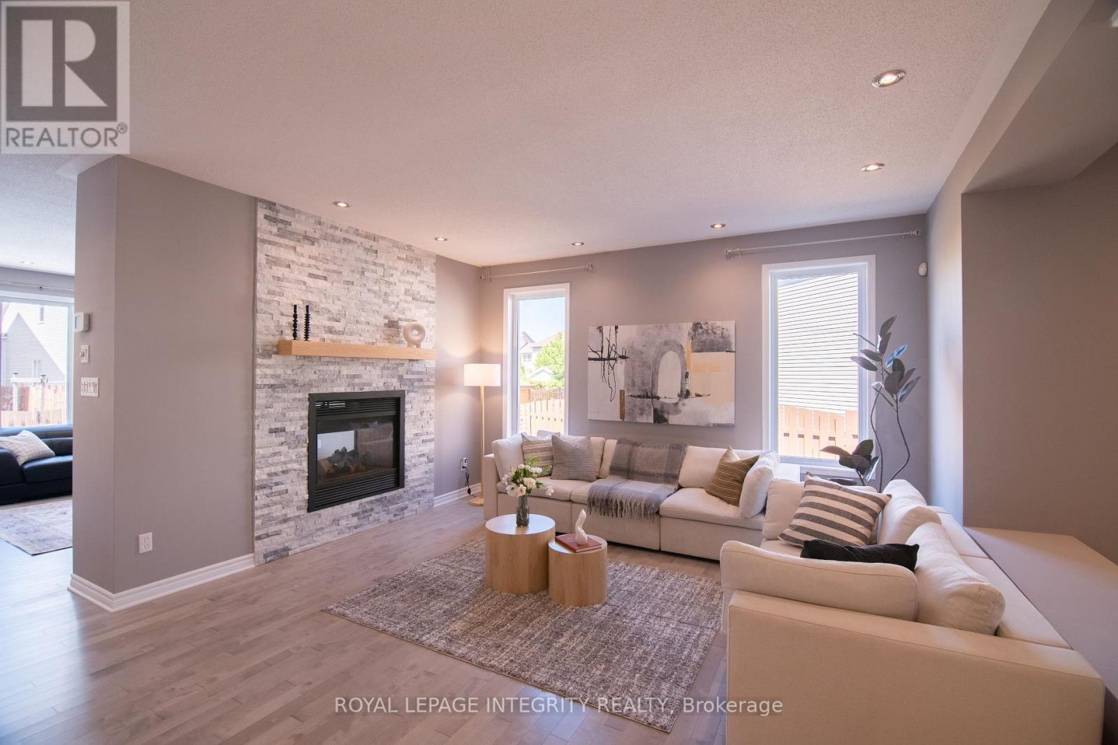 34 Keighley Circle, Ottawa, ON - Indoor Photo Showing Living Room With Fireplace
