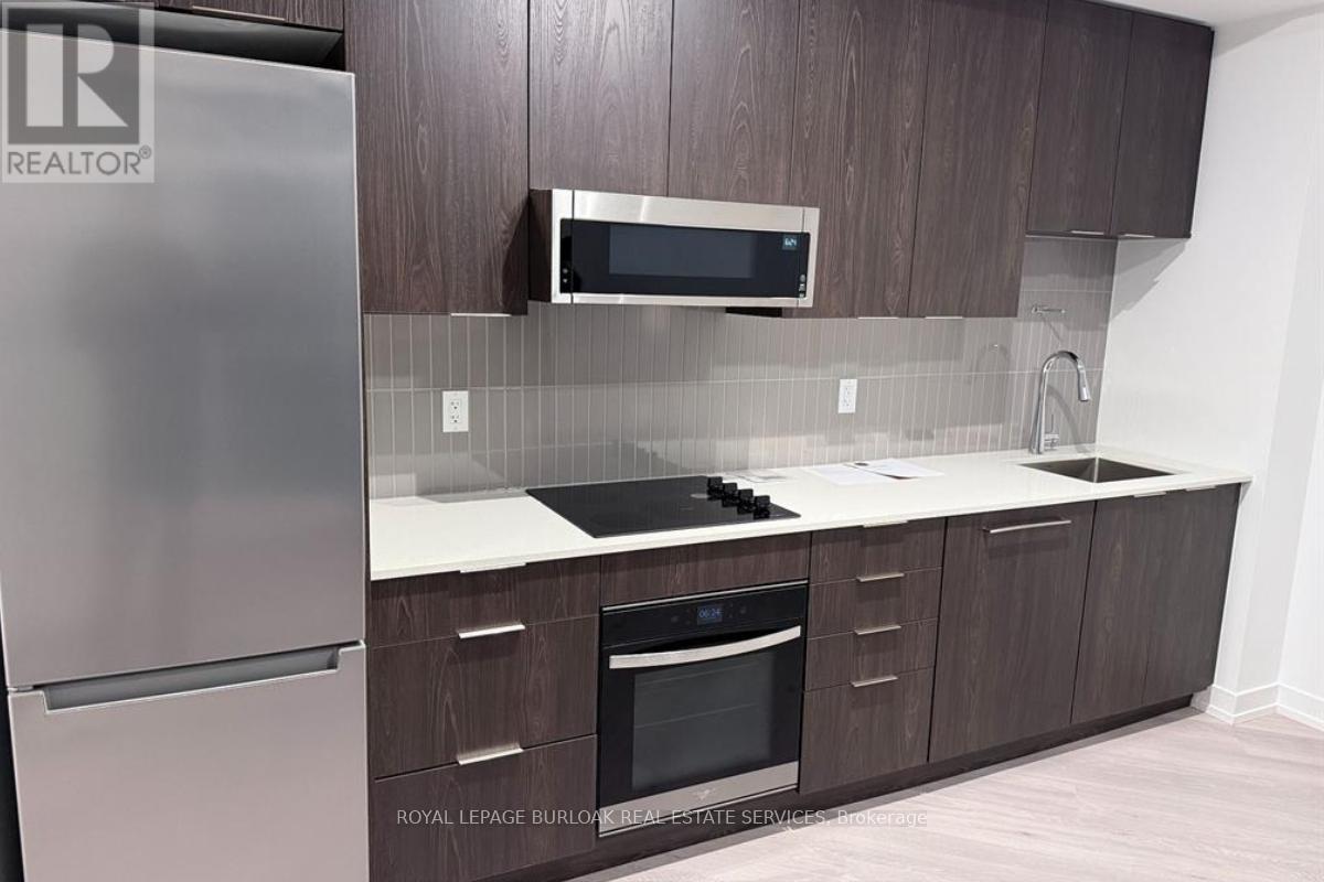 251 - 2501 Saw Whet Boulevard, Oakville, ON - Indoor Photo Showing Kitchen With Upgraded Kitchen