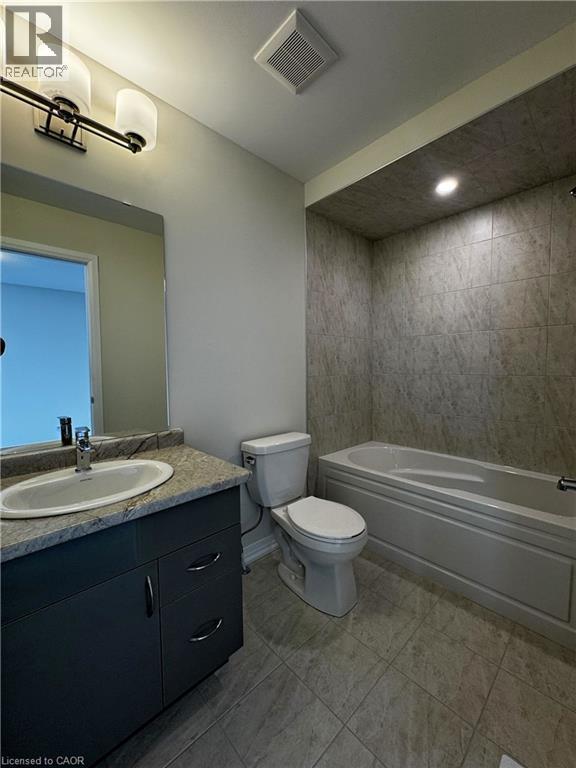Full bathroom with vanity and shower / bathtub combination - 660 Colborne Street W Unit# 57, Brantford, ON - Indoor Photo Showing Bathroom
