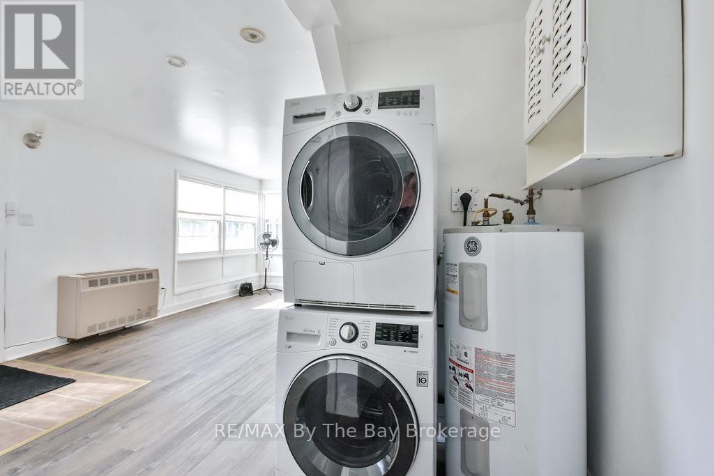 1 - 1067 Mosley Street, Wasaga Beach, ON - Indoor Photo Showing Laundry Room