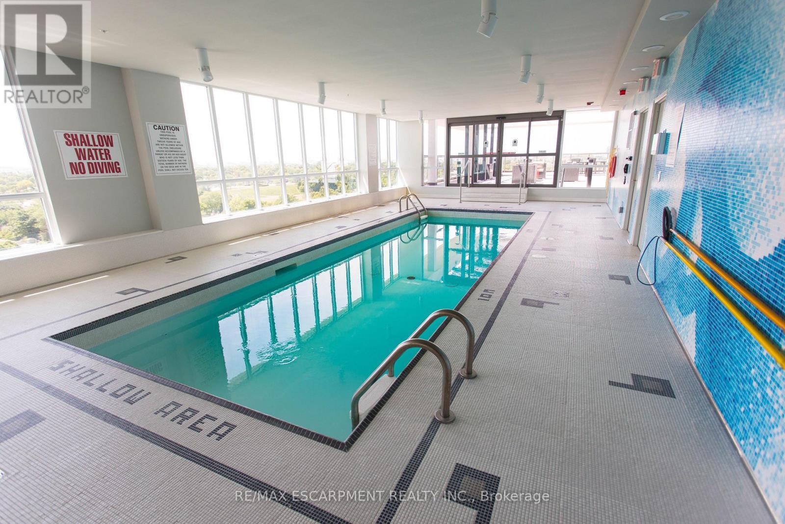 104 - 80 Esther Lorrie Drive, Toronto, ON - Indoor Photo Showing Other Room With In Ground Pool