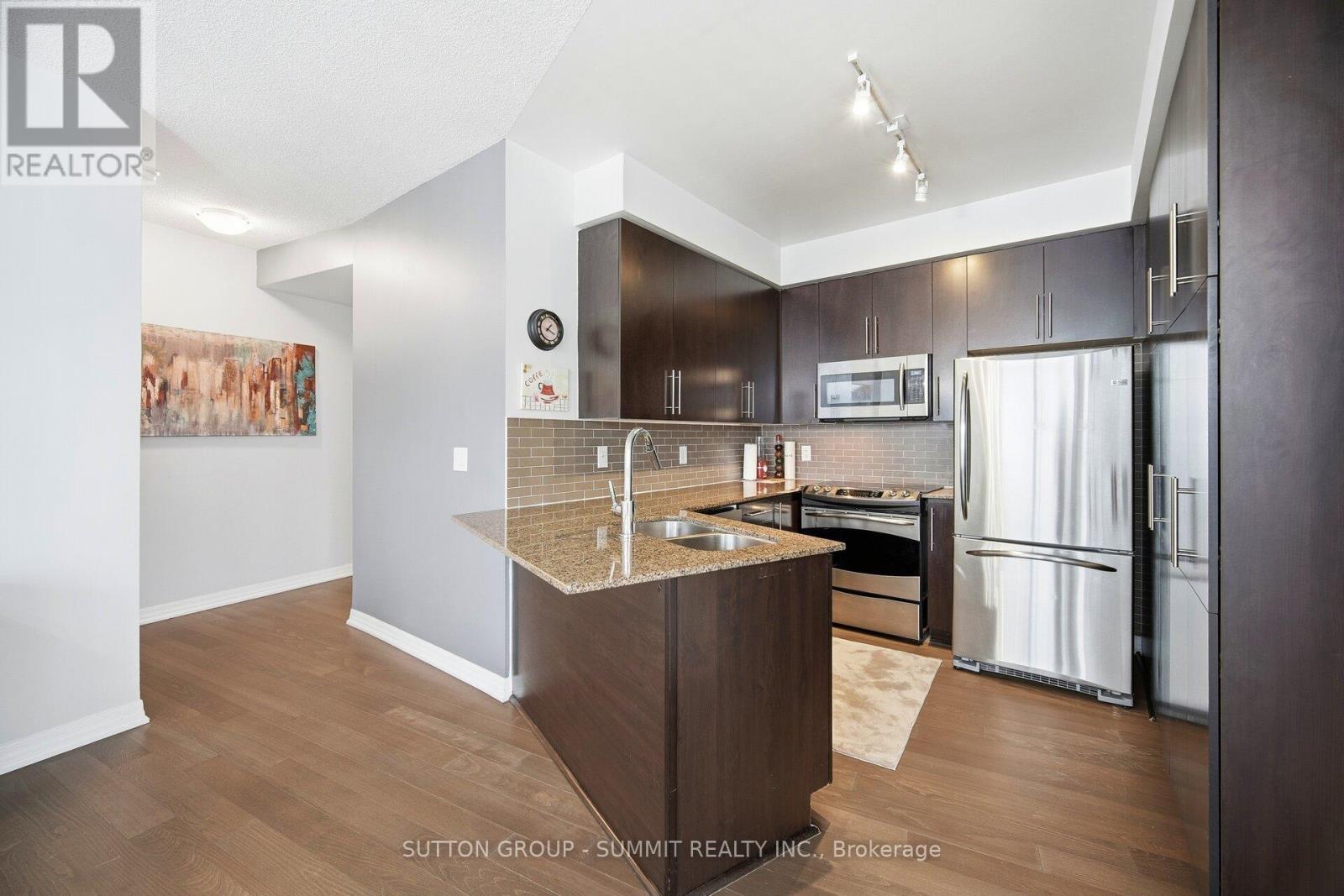 1705 - 223 Webb Drive, Mississauga, ON - Indoor Photo Showing Kitchen With Stainless Steel Kitchen With Double Sink