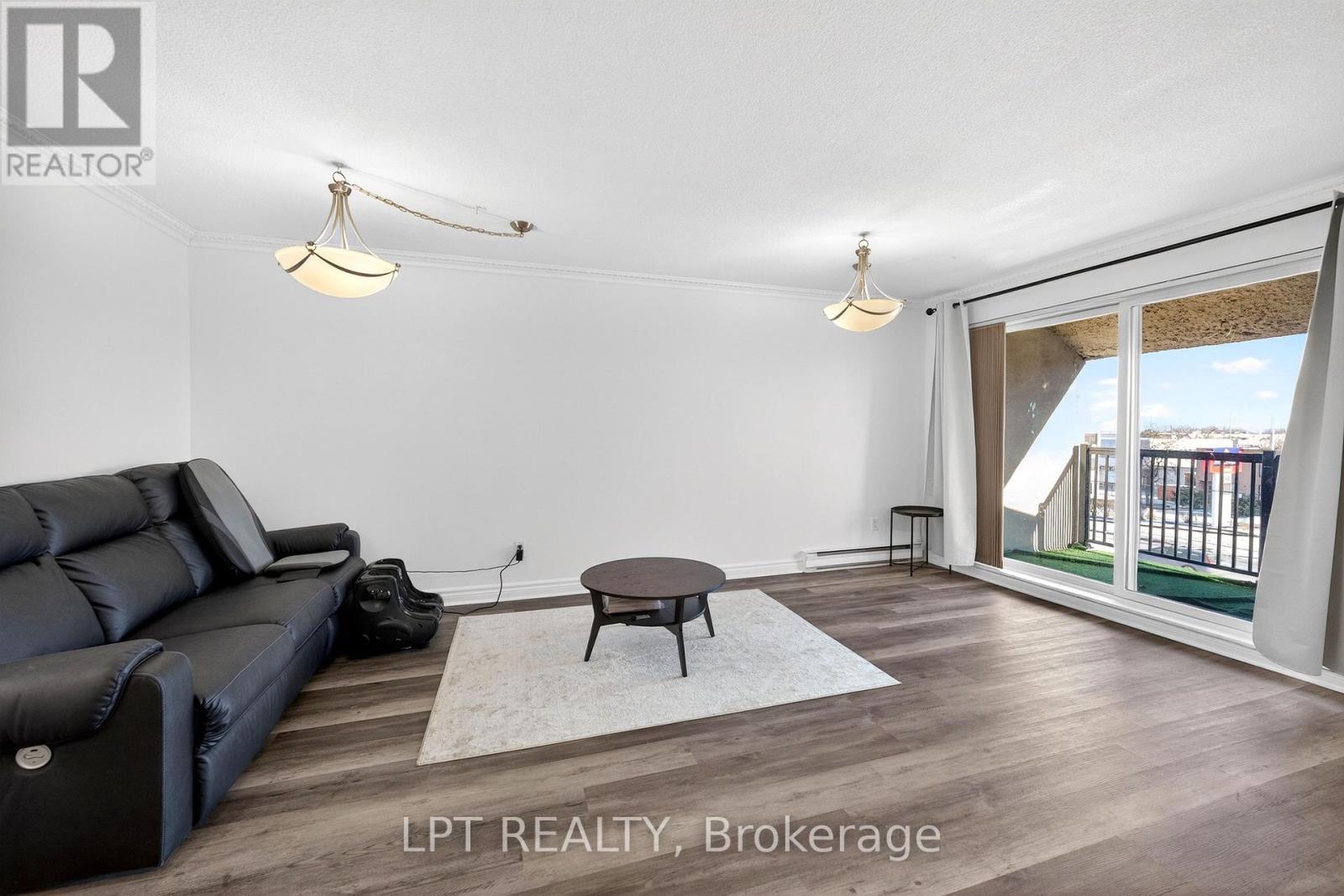103 - 3040 Constitution Boulevard, Mississauga, ON - Indoor Photo Showing Living Room
