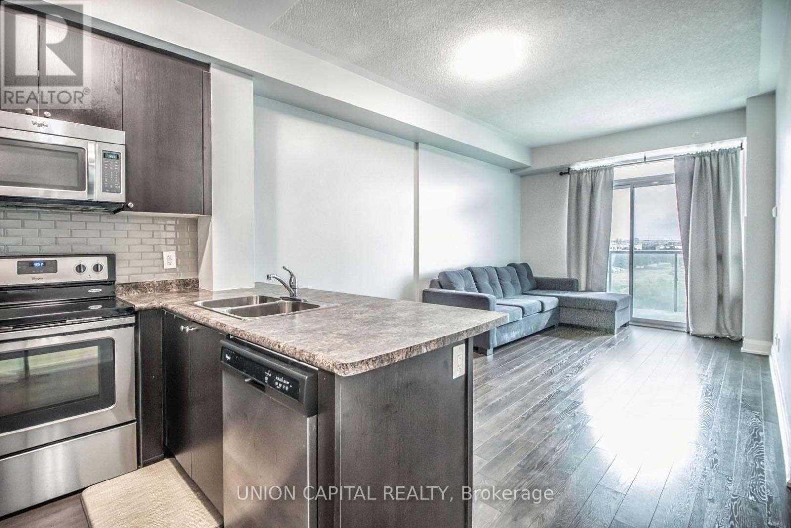 306 - 55 Yorkland Boulevard, Brampton, ON - Indoor Photo Showing Kitchen With Stainless Steel Kitchen With Double Sink