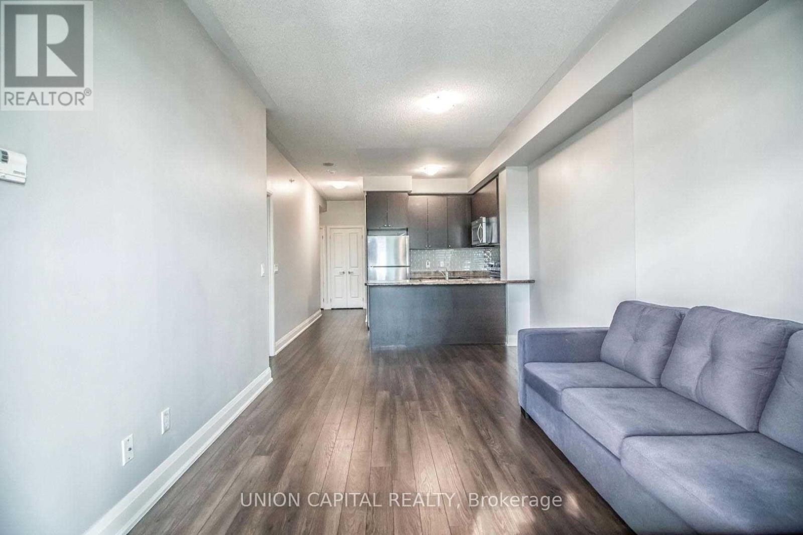 306 - 55 Yorkland Boulevard, Brampton, ON - Indoor Photo Showing Living Room